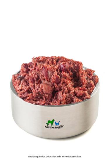Entenhälse-Herzen-Mägen-Mix in a metal bowl, pet food for cats and dogs.