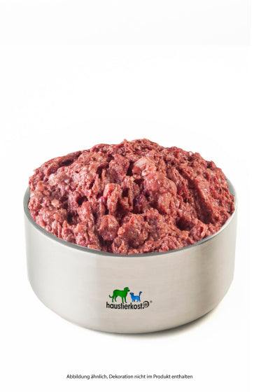 Kaninchen-Komplett Extra, Rohfutter für Hunde in Metallschüssel.