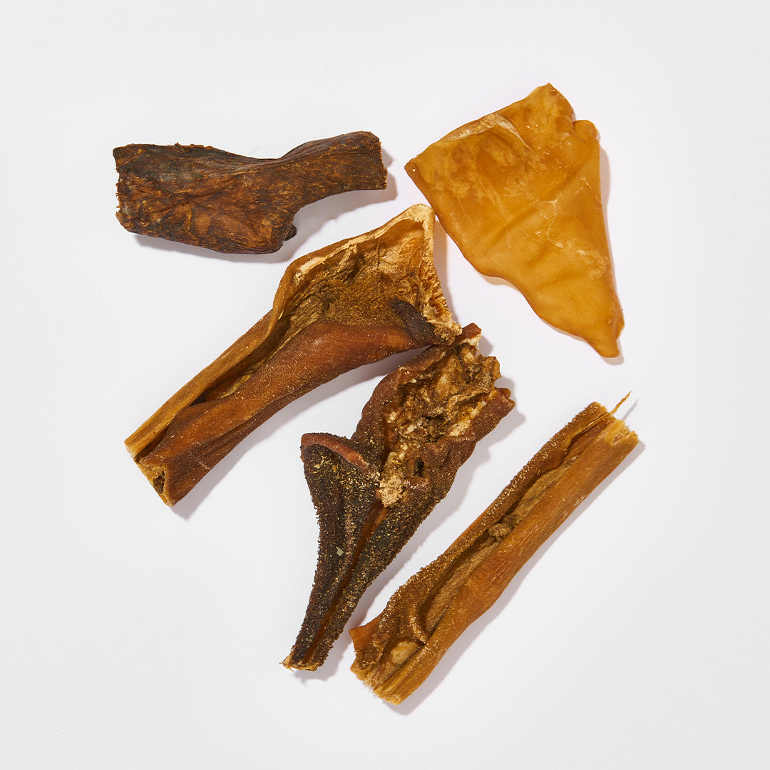 Kauspaß Mix-Tüte Rind 1 kg mit Rinderpansen, Rinderlunge, Schweinehaut, Ochsenziemer, Rinderhaut und Rinderstrosse als Knabberspaß für Hunde