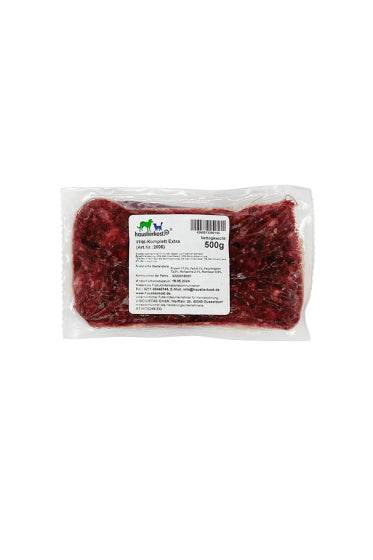 Wild-Komplett Extra, 500 g Verpackung für Hunde, enthält Reh und Hirsch mit Innereien und Knochen.