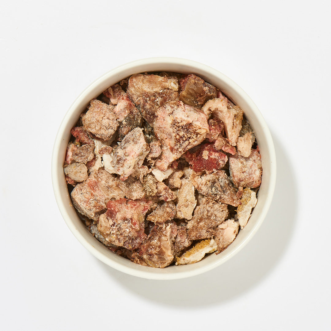 Rinder-Mix gefrorene grob geschnittene Innereien und Fleischstücke als 1 kg Portion für Hunde und Katzen