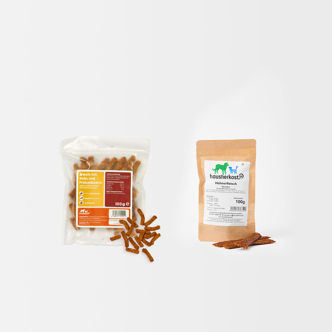 Kauartikel-Paket Huhn mit getrocknetem Hühnerfleisch und Treats mit Huhn und Preiselbeere in Verpackungen
