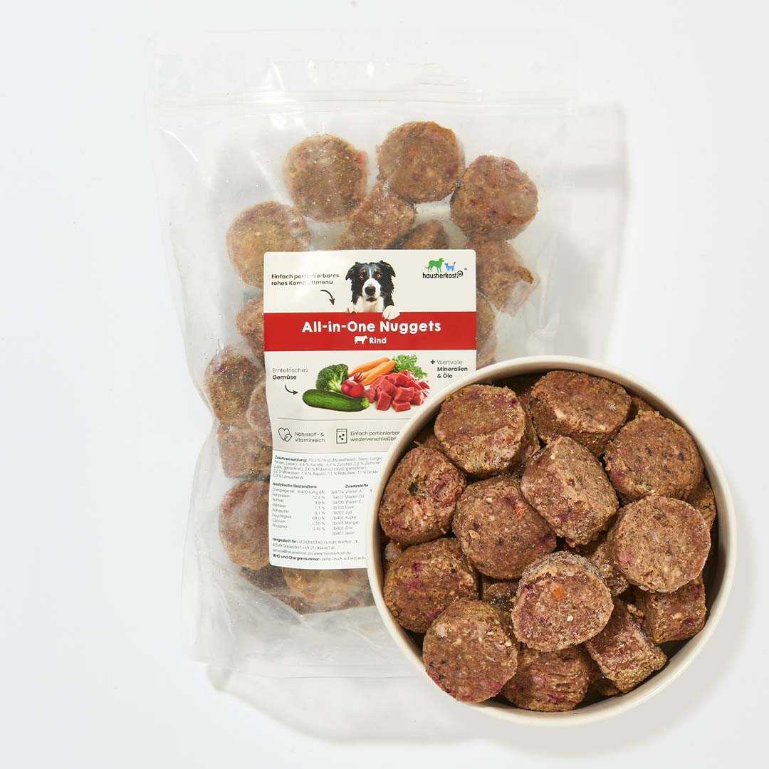 All-in-One Nuggets Rind, Komplettmenü für Hunde, Monoprotein, hochwertige Zutaten, ohne Zuckerzusatz, in Schüssel und Verpackung.